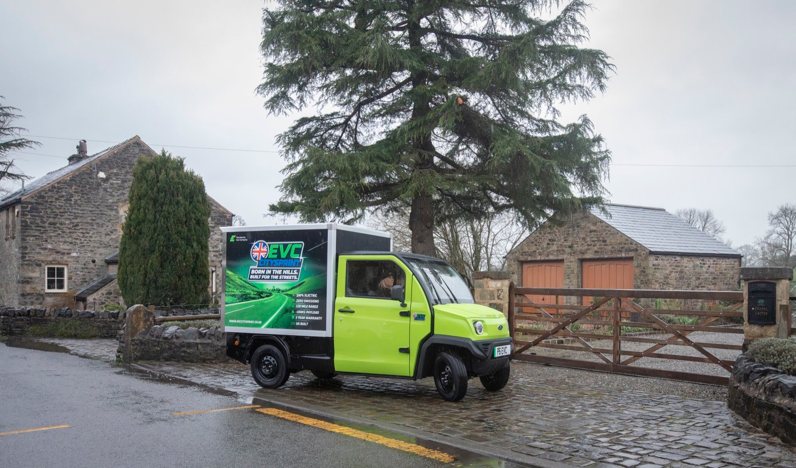 EVC CitySprint delivering in a stone-built village