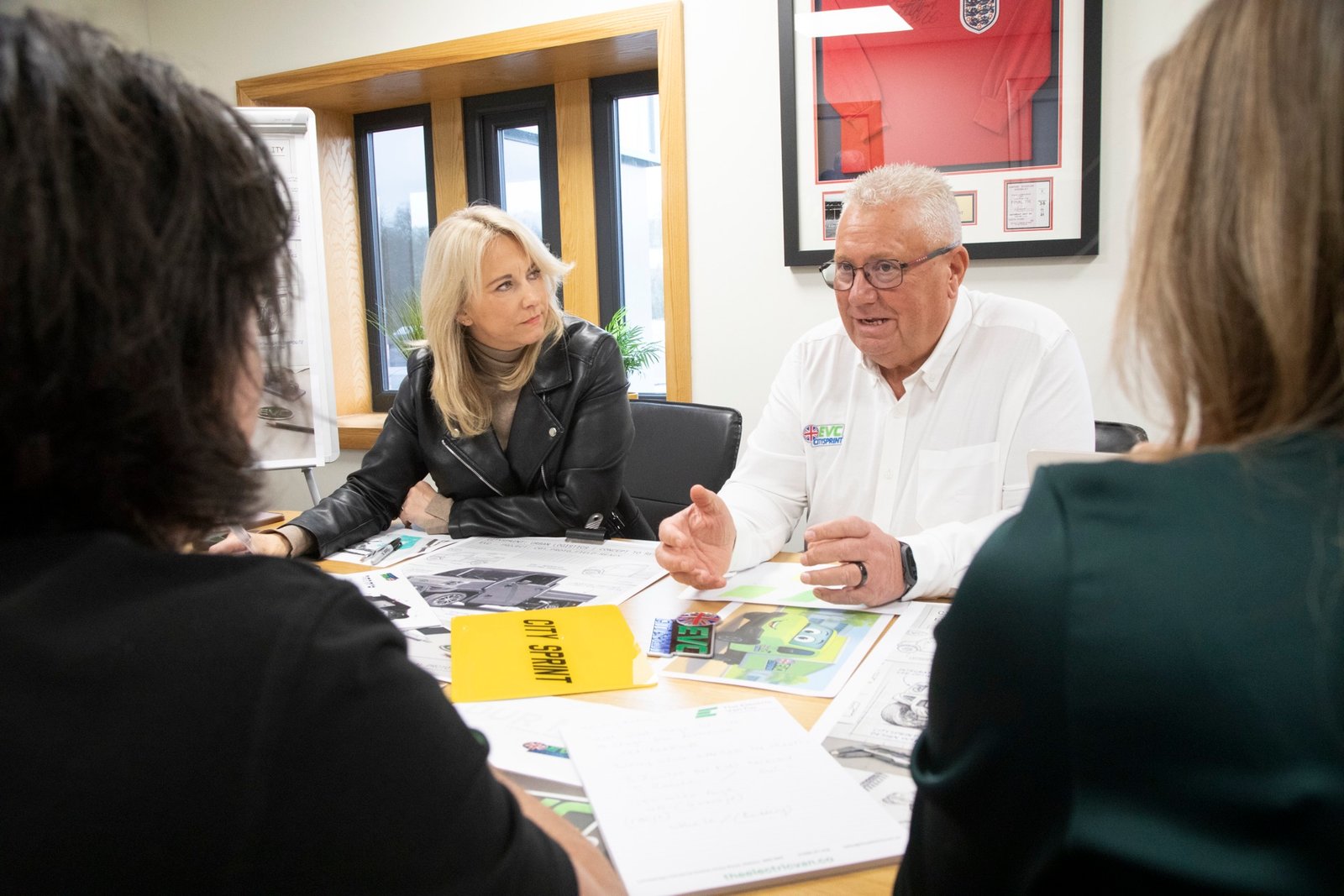 EVC founder leading design brief in boardroom