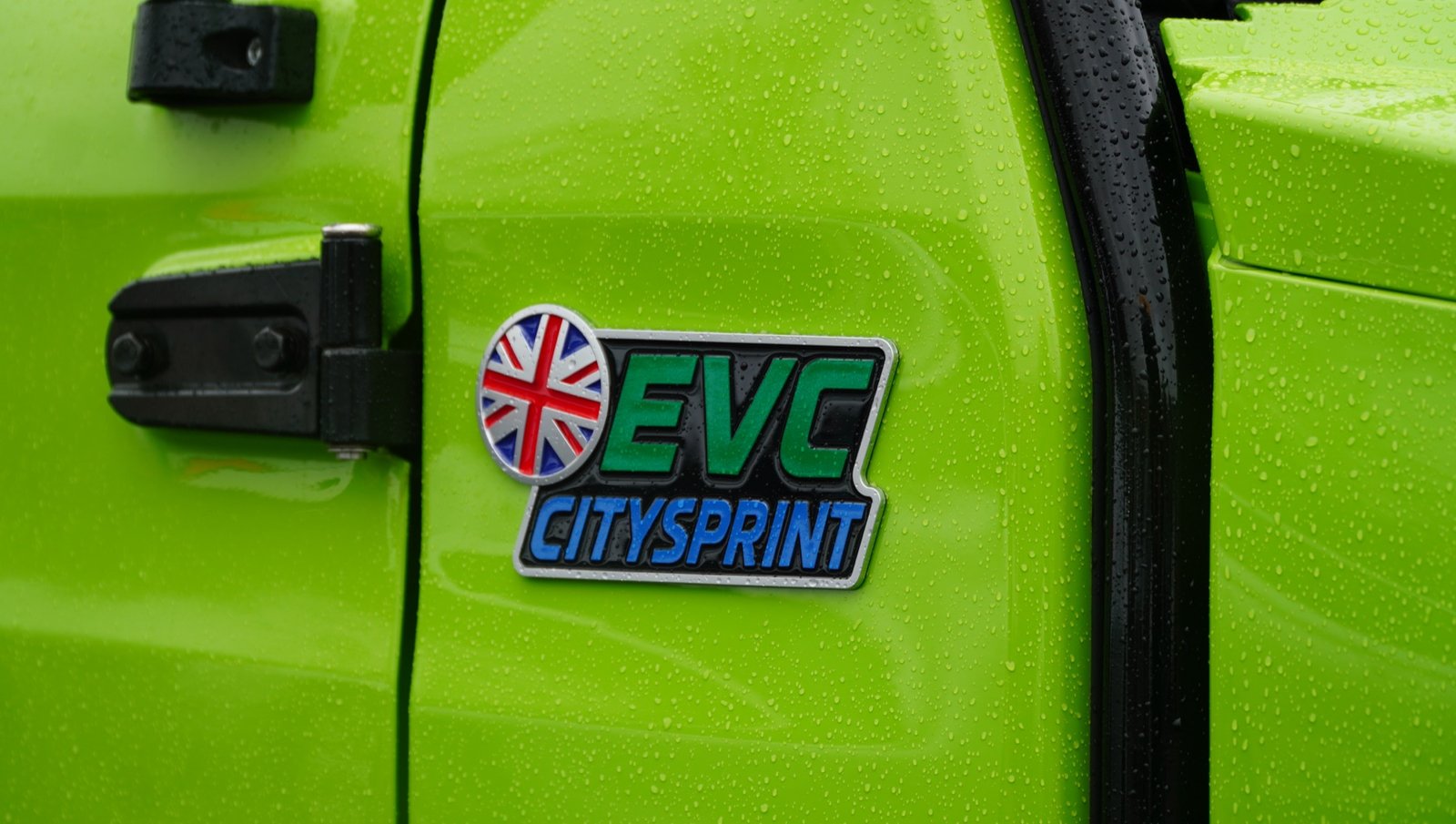 Union Jack badge on CitySprint in the rain