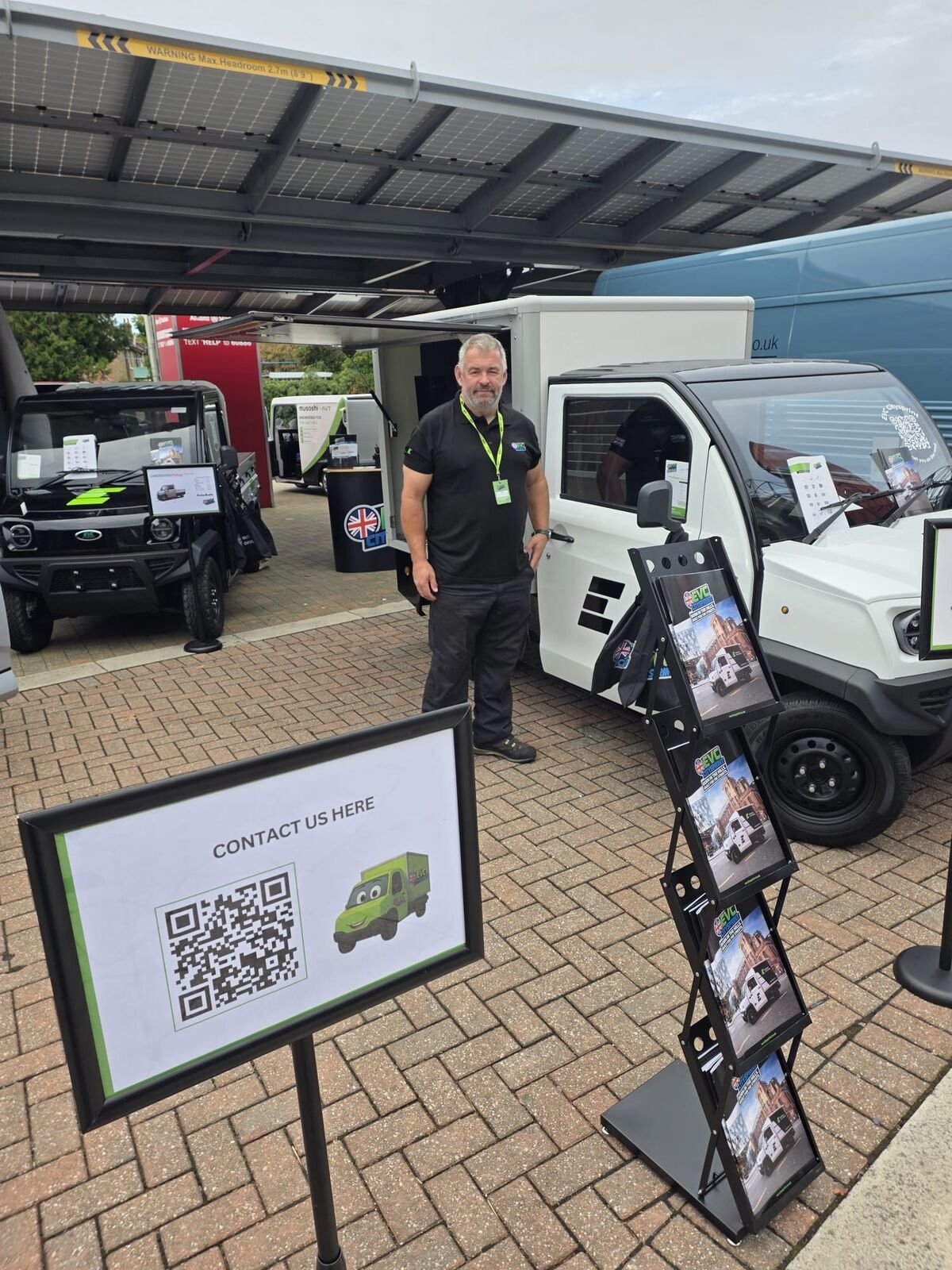 The EVC team ready to chat on the stand