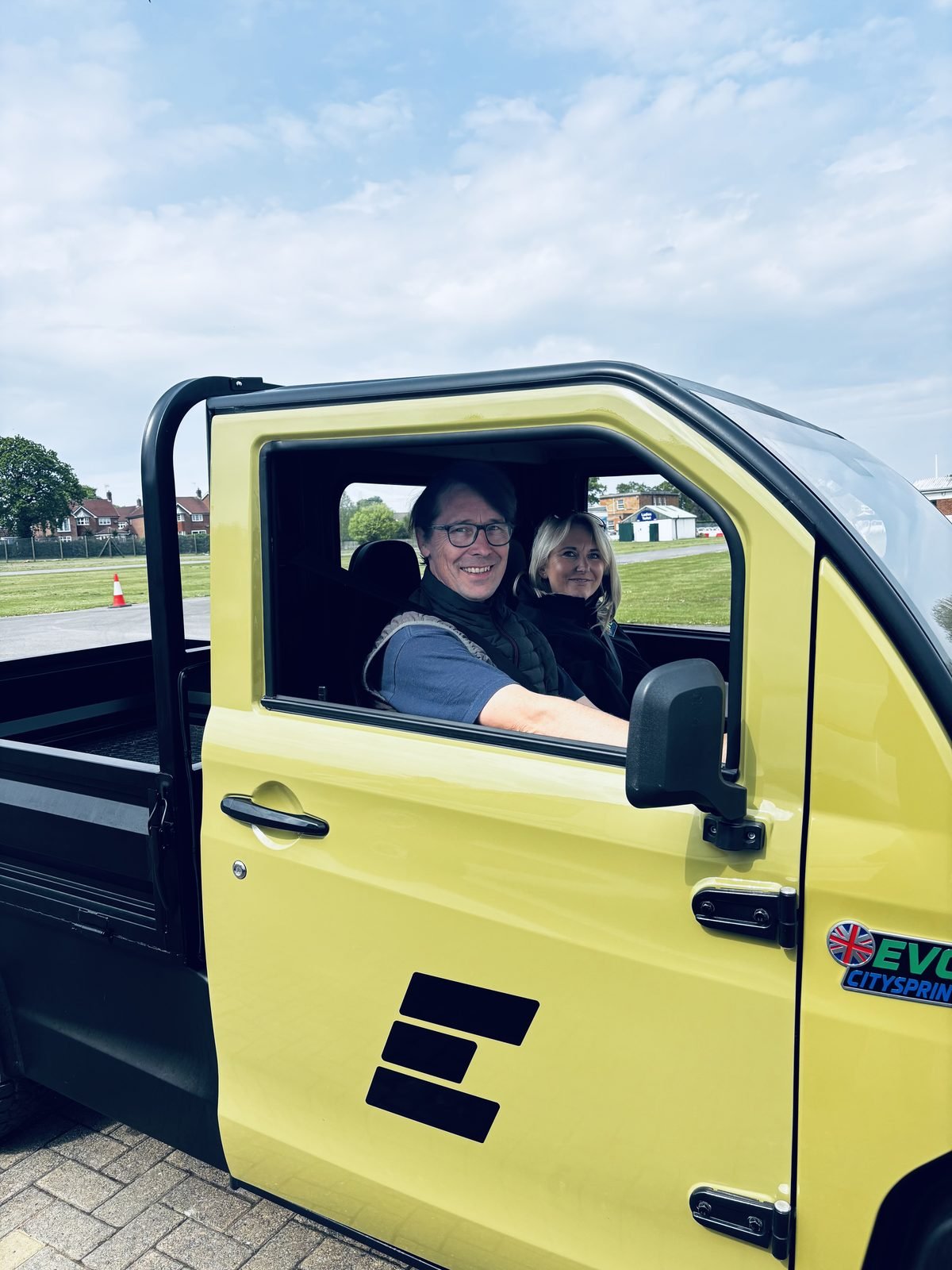 Behind the wheel of the yellow CitySprint pickup