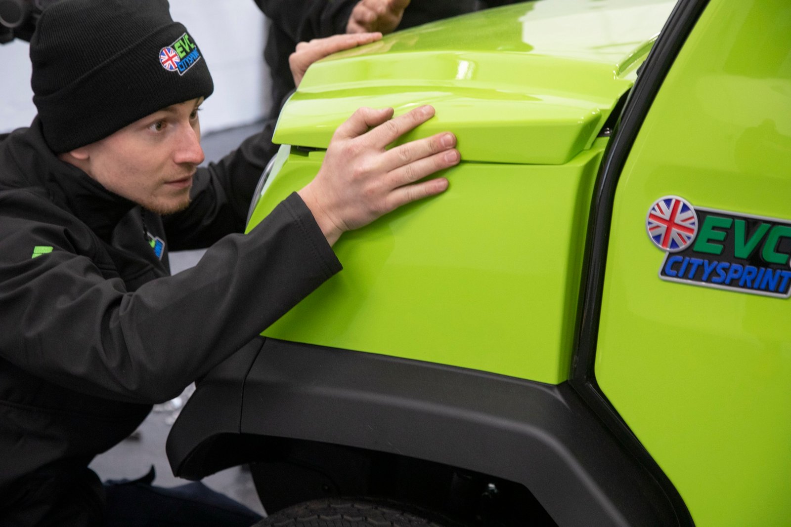 Body panel being fitted to CitySprint during assembly
