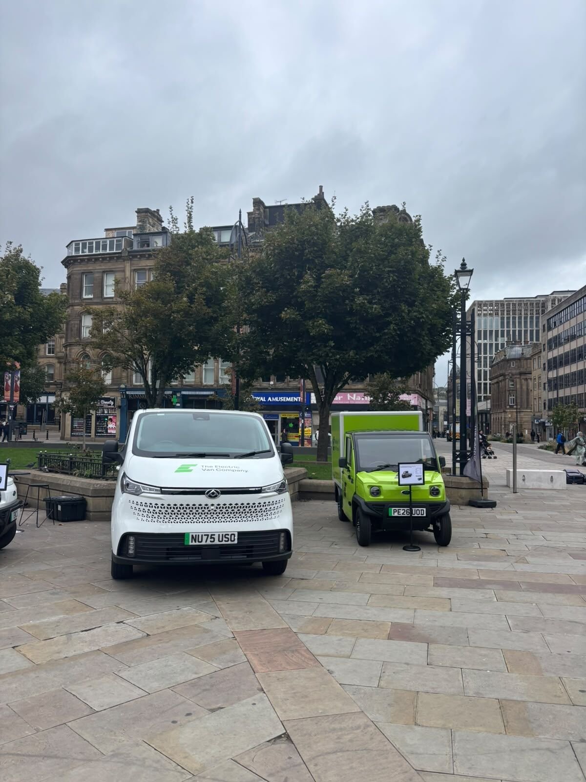 A Maxus van and a lime CitySprint Cargo Box on display