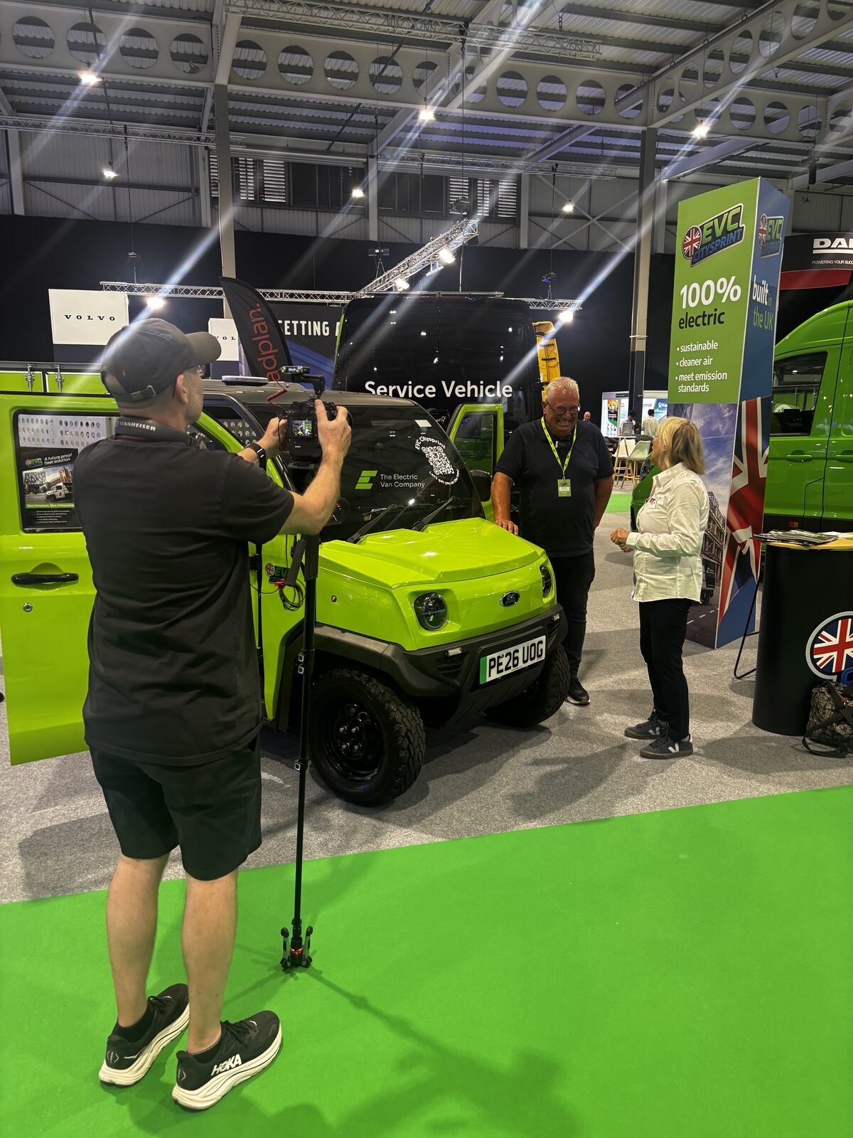 The EVC service vehicle in front of the cameras on the show floor